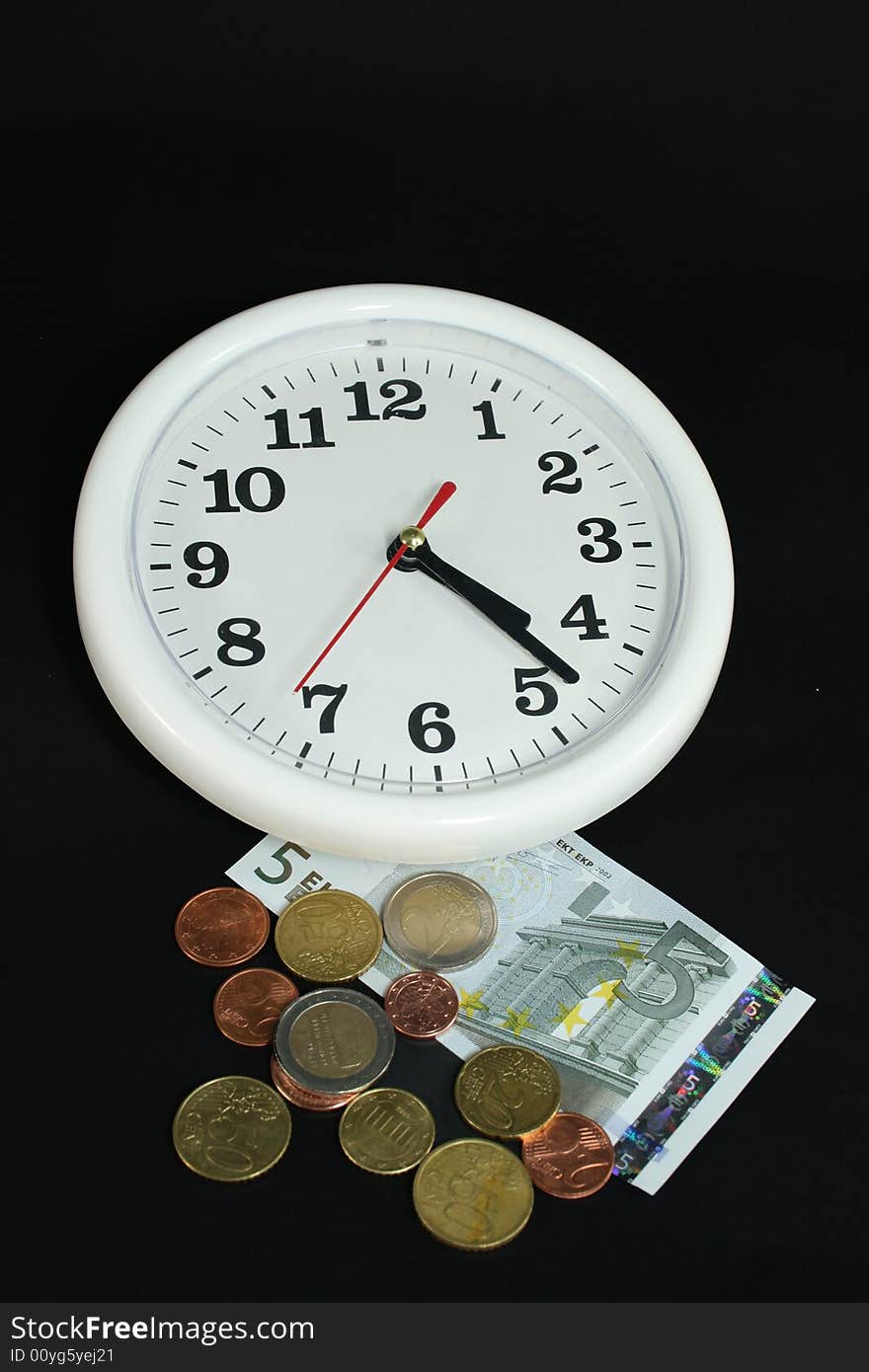 White clock and money on black background as symbol and sample for my isolated business and concept images. White clock and money on black background as symbol and sample for my isolated business and concept images