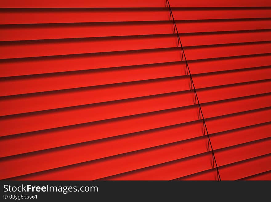 Plastic venetian blind in red color. Plastic venetian blind in red color