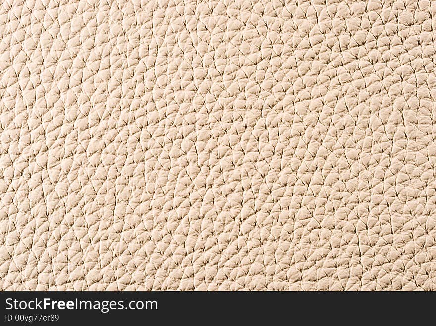 Natural qualitative beige leather texture. Close up. Natural qualitative beige leather texture. Close up.