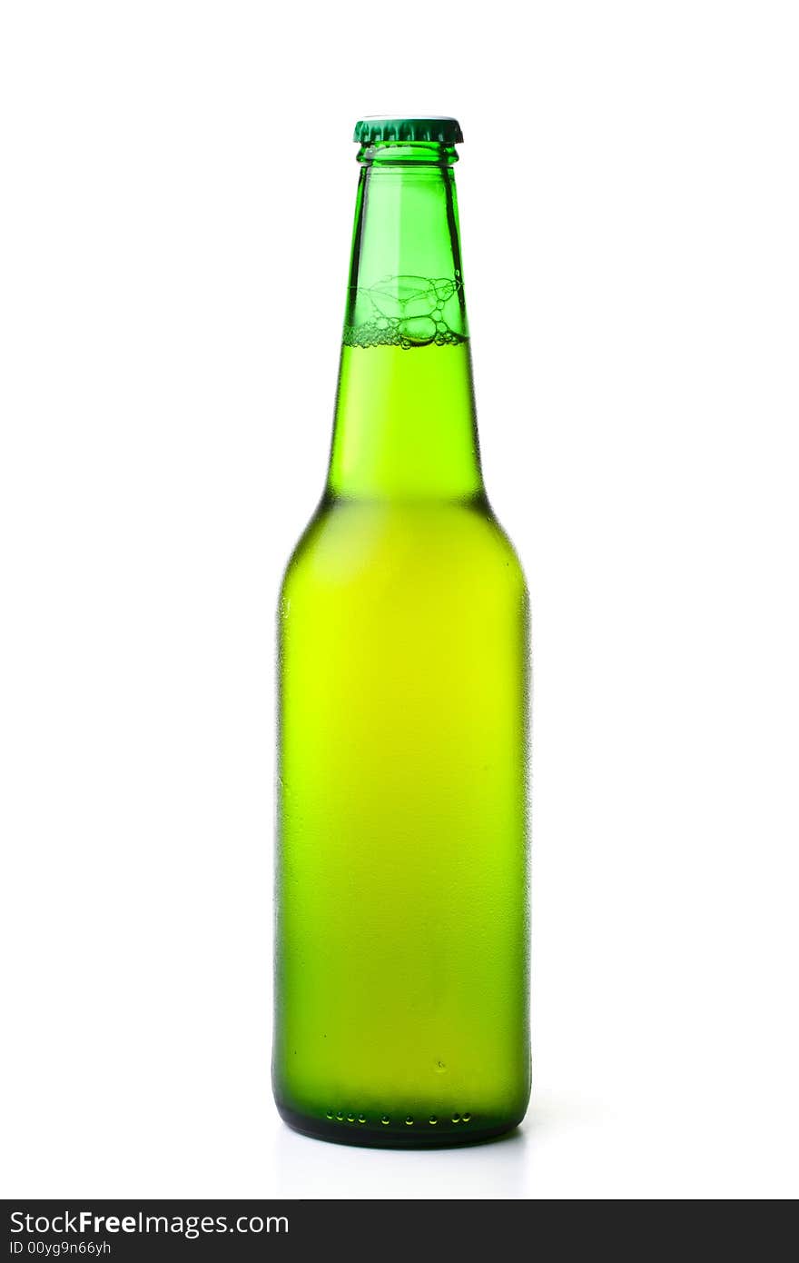 The misted over bottle of beer on a white background.