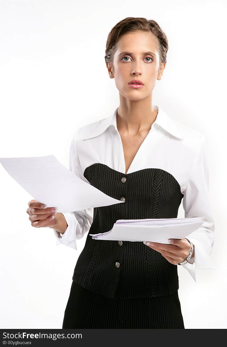 Attractive Fine business-lady holds a With sheets of a paper. Attractive Fine business-lady holds a With sheets of a paper