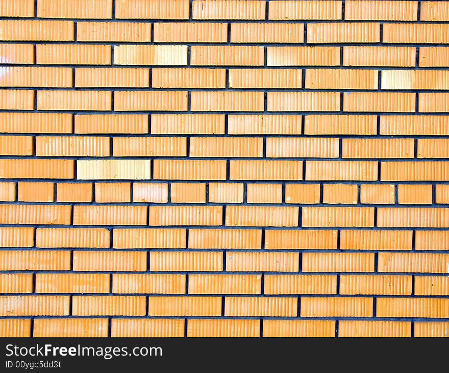 Wall made of red and yellow bricks. Wall made of red and yellow bricks