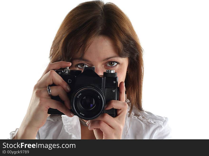 Young woman with old camera isolated on white background