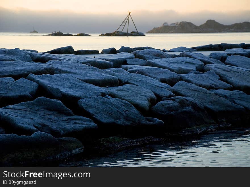 Breakwaters in winter with sunset and horisont. Breakwaters in winter with sunset and horisont.