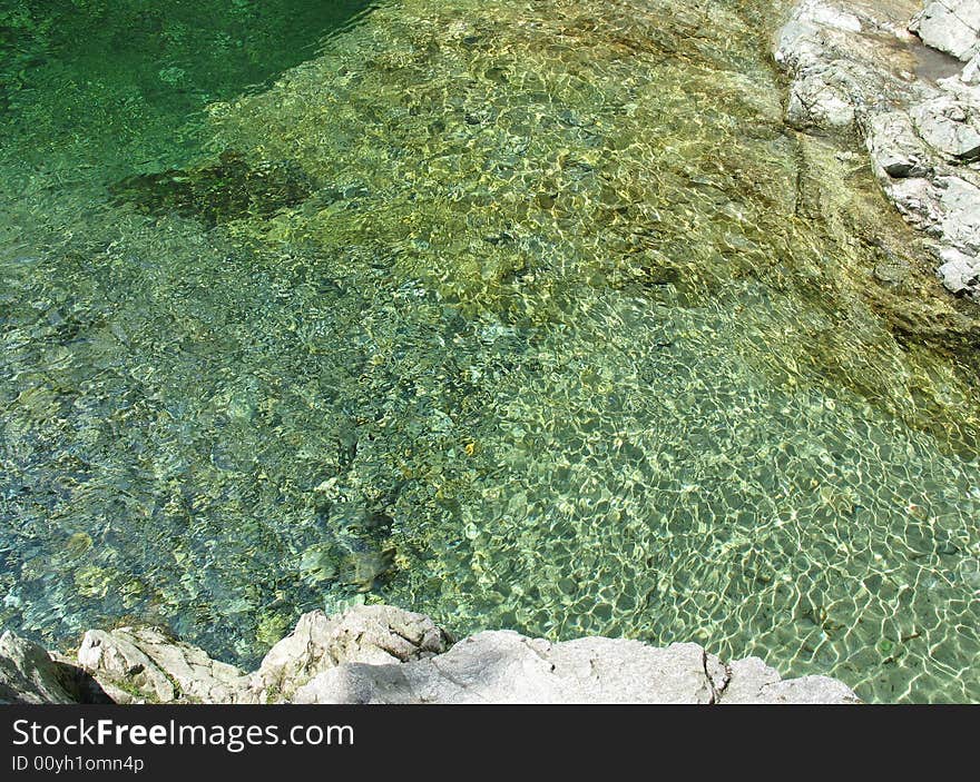 Very clear green river water