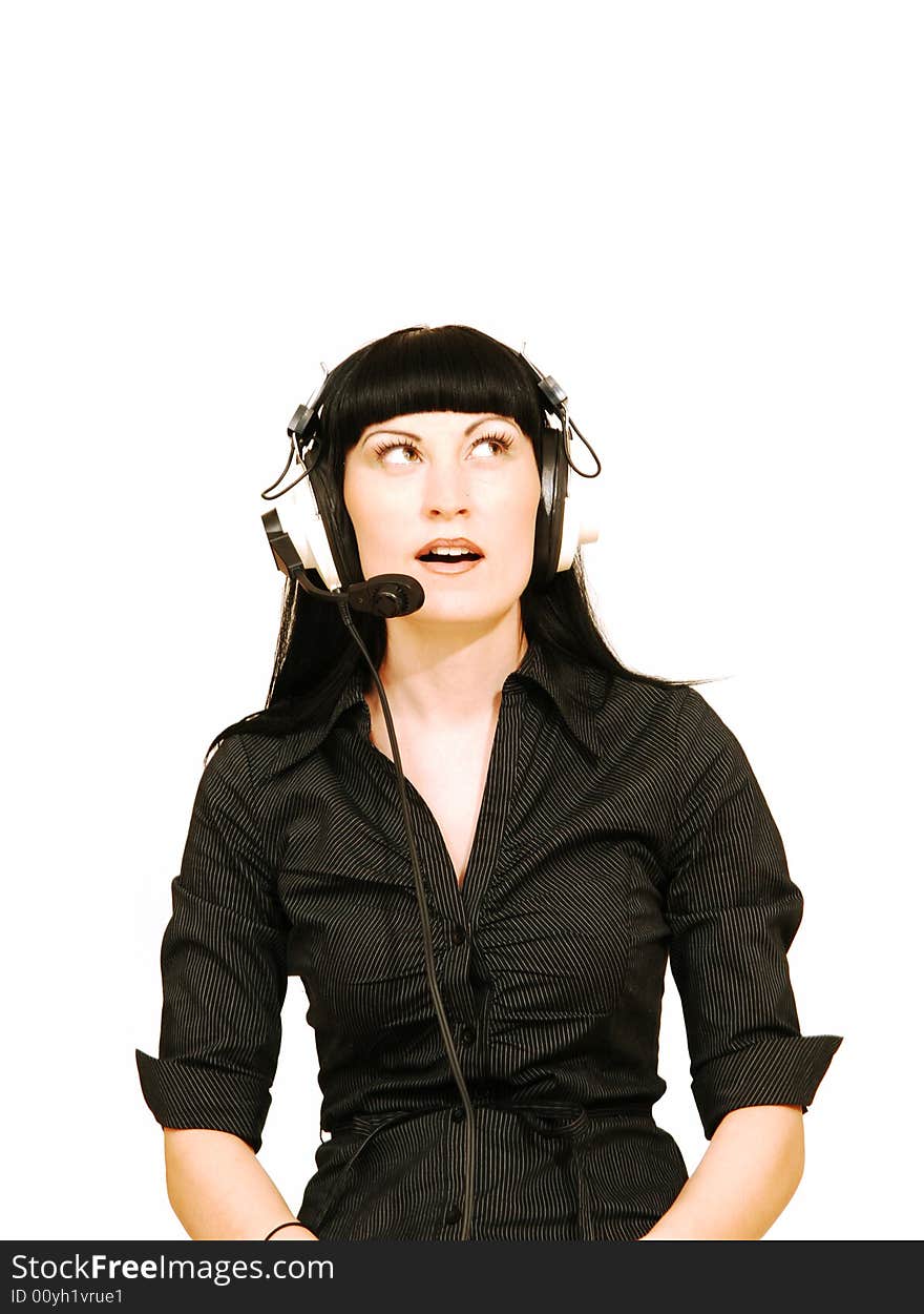 An fit woman in a black dress sitting in an call centre 
for white background and talking to her customer. An fit woman in a black dress sitting in an call centre 
for white background and talking to her customer.