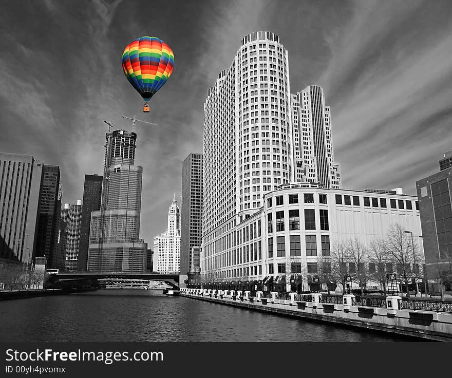 The Chicago Skyline in black and white with colorful hot air balloon.