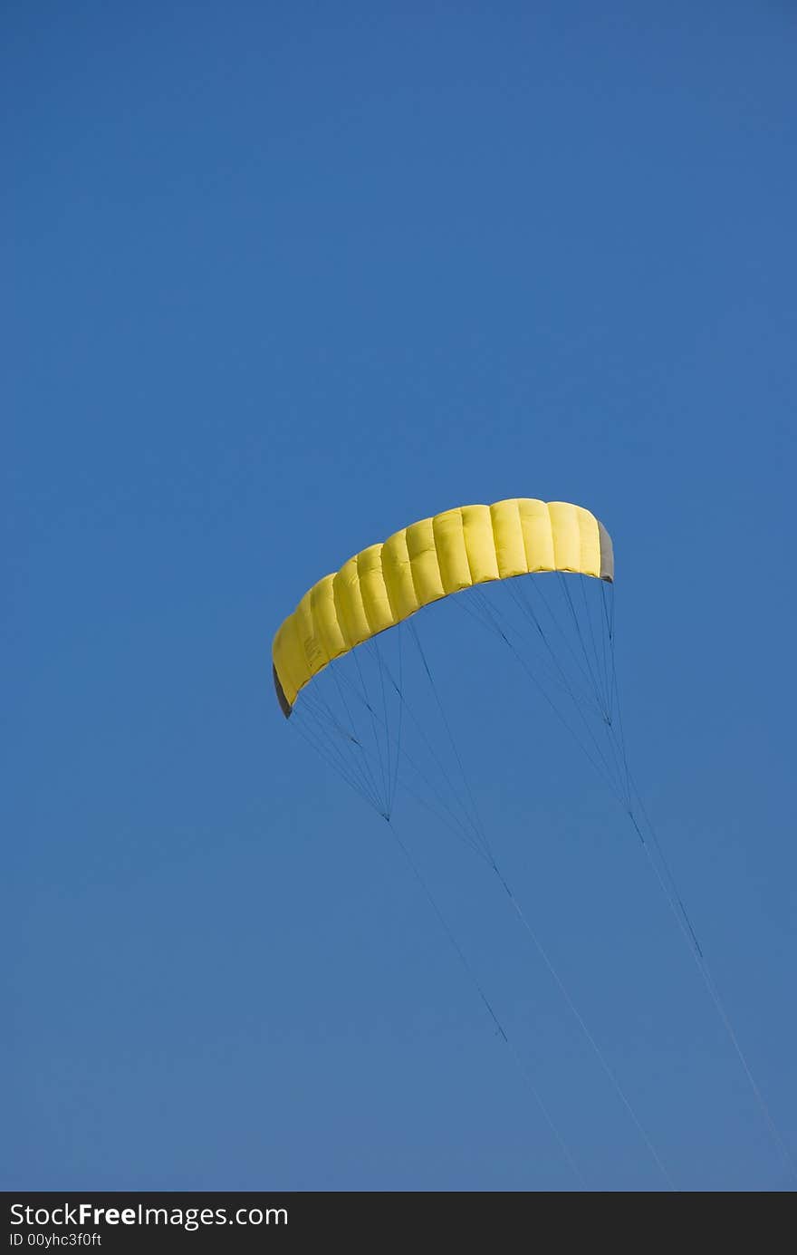 Yellow Kite In The Blue Sky