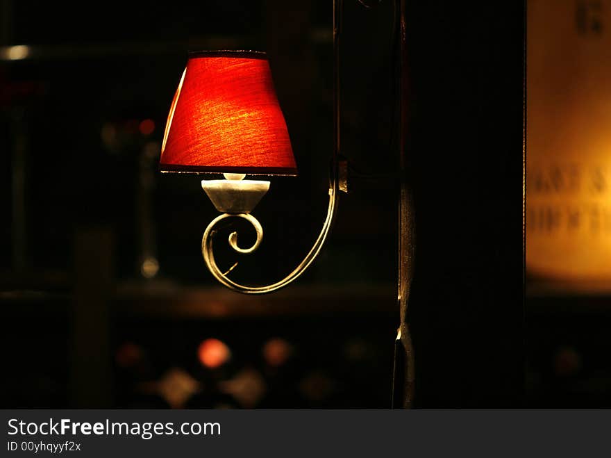 Open wall red  lamp in a restaurant. Open wall red  lamp in a restaurant