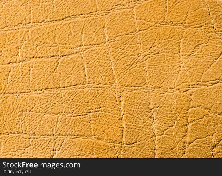 Natural qualitative beige leather texture. Close up. Natural qualitative beige leather texture. Close up.