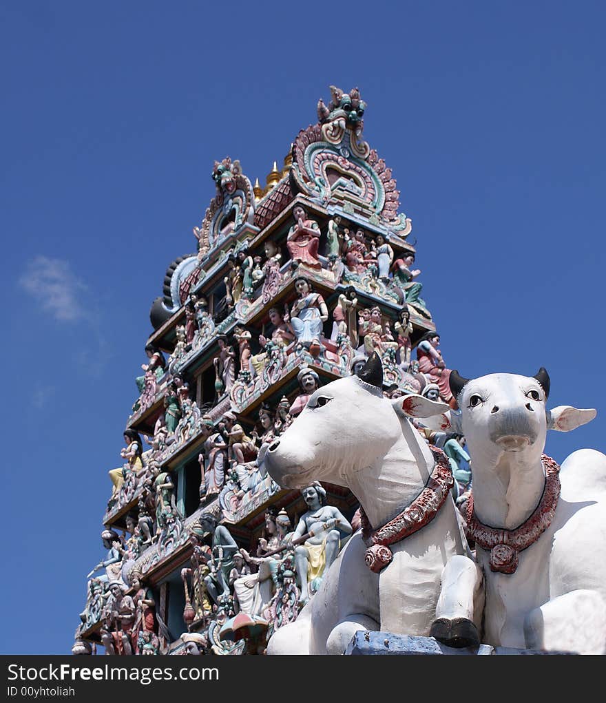 Traditional indian totem with a blue sky as the background