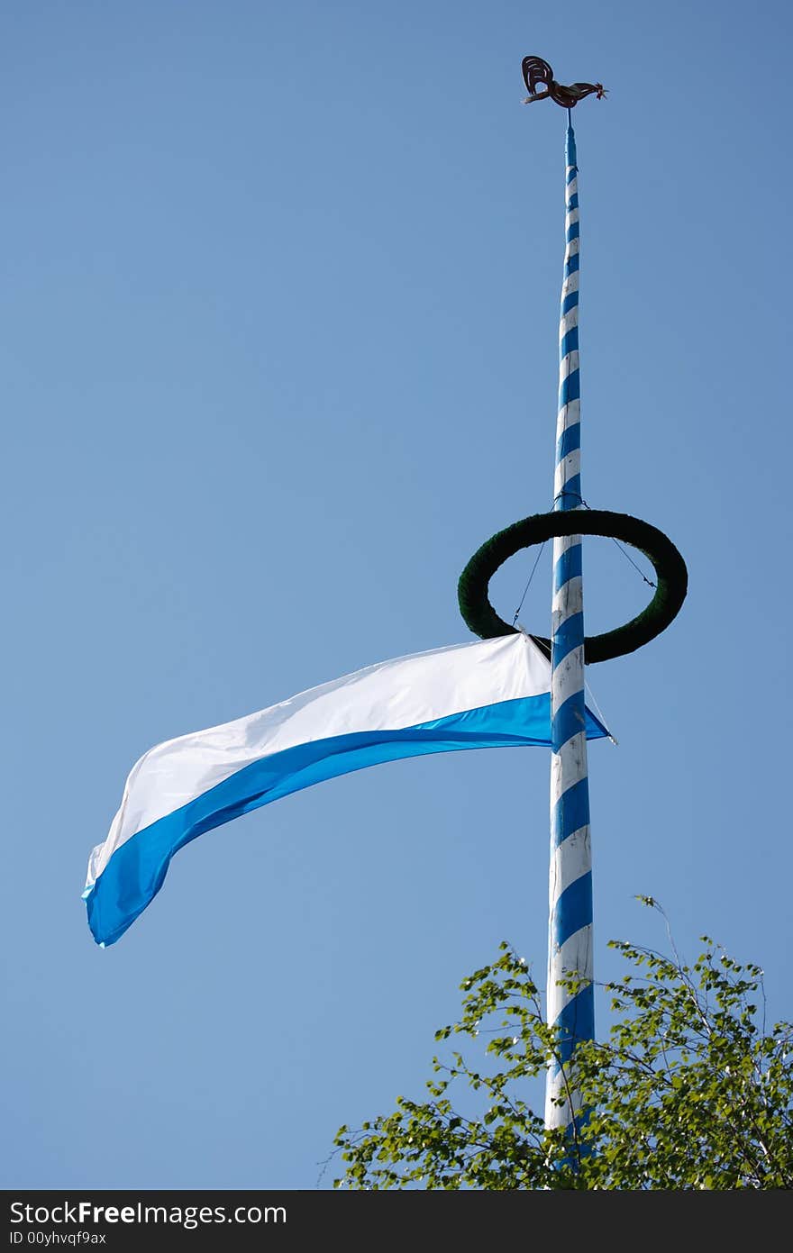 Maypole with bavarian flag in germany