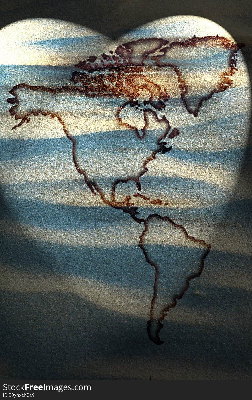 North and south America continents map on sand. North and south America continents map on sand