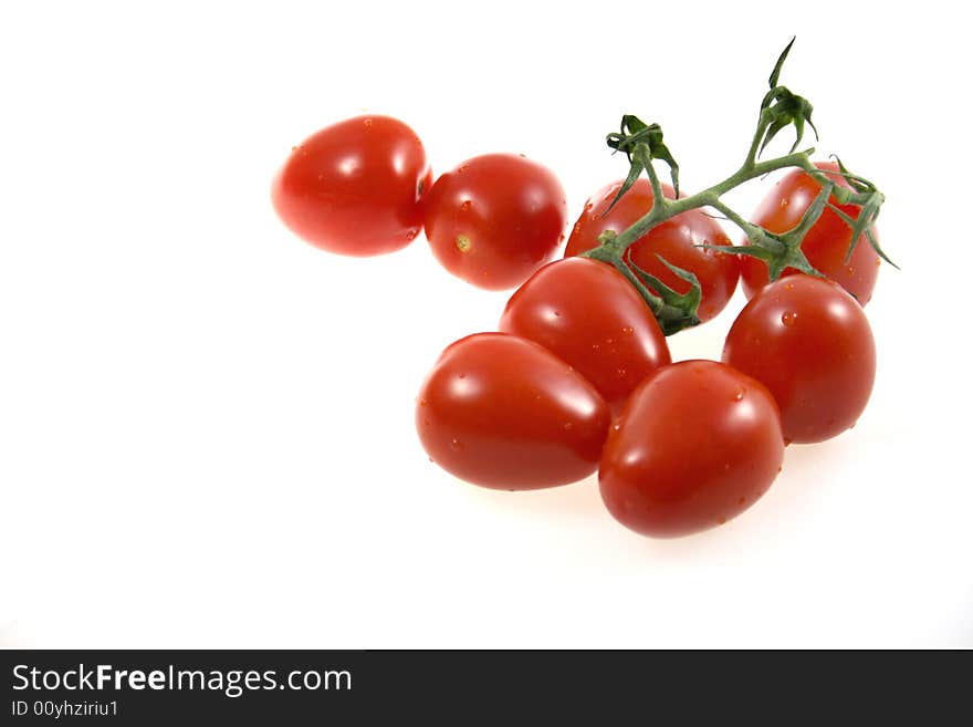 Sweet tomatoes on white background. Sweet tomatoes on white background