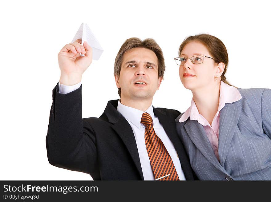 Business man and woman with paper airplane in hands. Business man and woman with paper airplane in hands