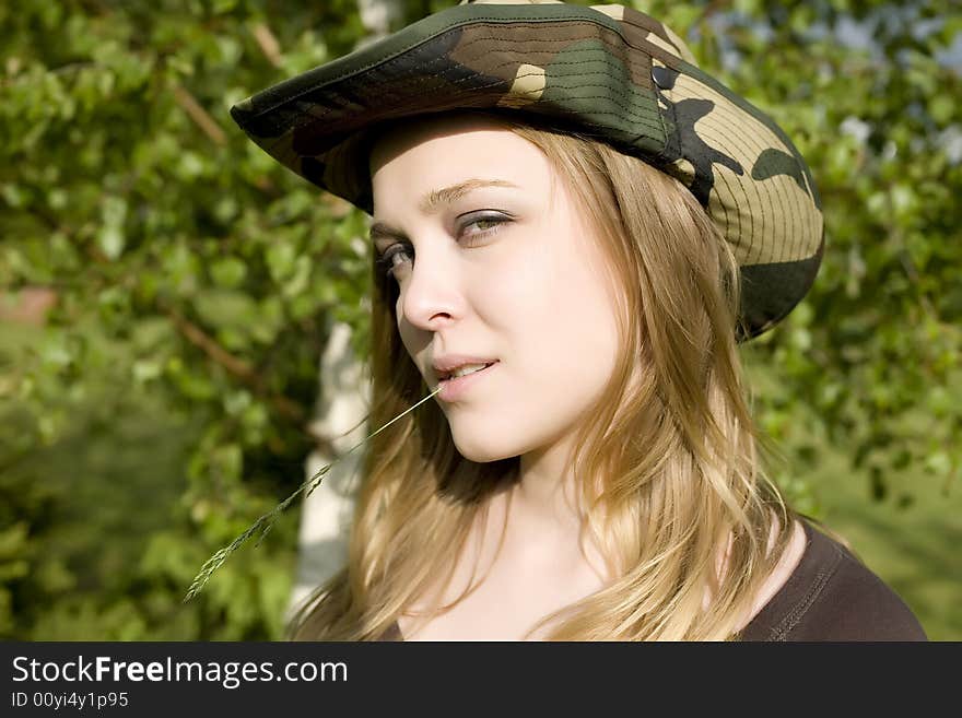 The Woman In A Camouflage Hat. The Woman In A Camouflage Hat