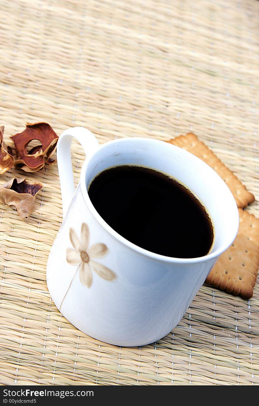 Cup of hot coffee with two biscuits. Cup of hot coffee with two biscuits