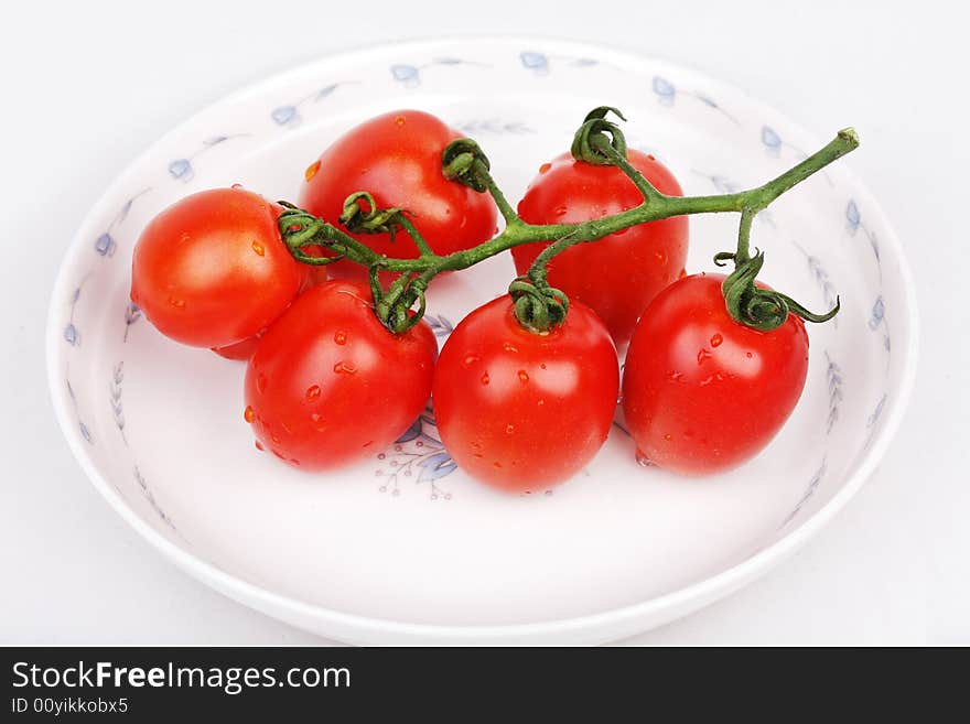 Fresh tomato with white background