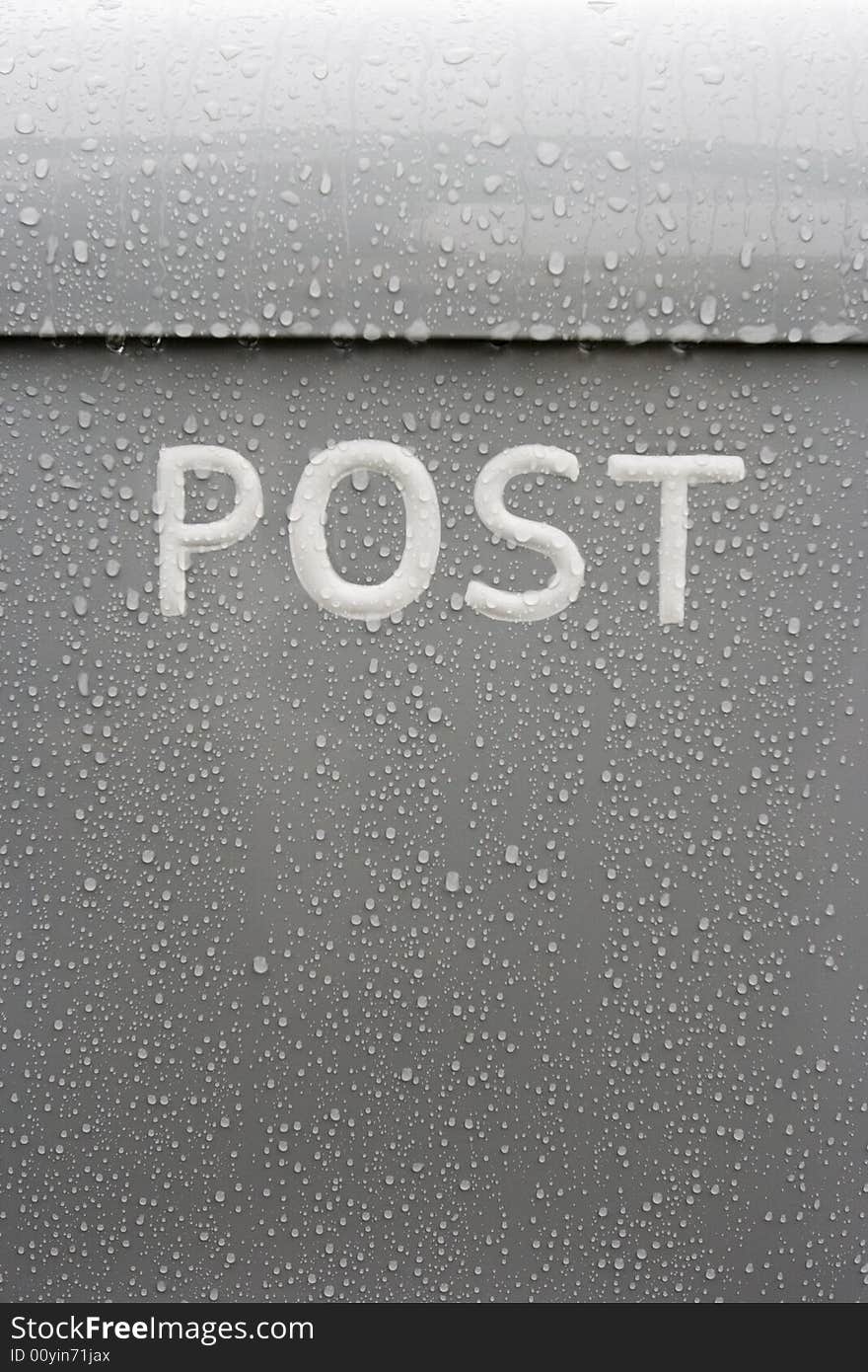 Raindrops falling on the postbox. Raindrops falling on the postbox