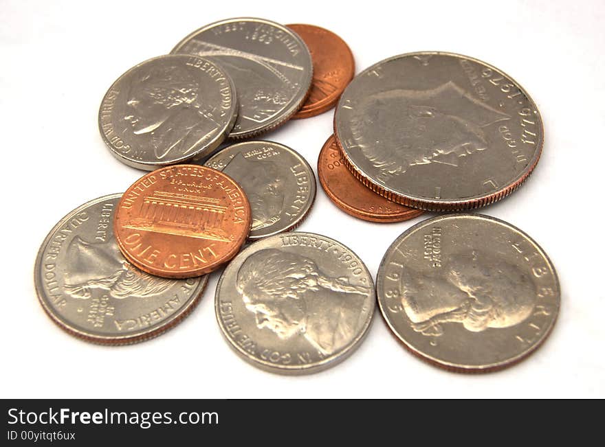 A photograph of a variety of coins against a white background