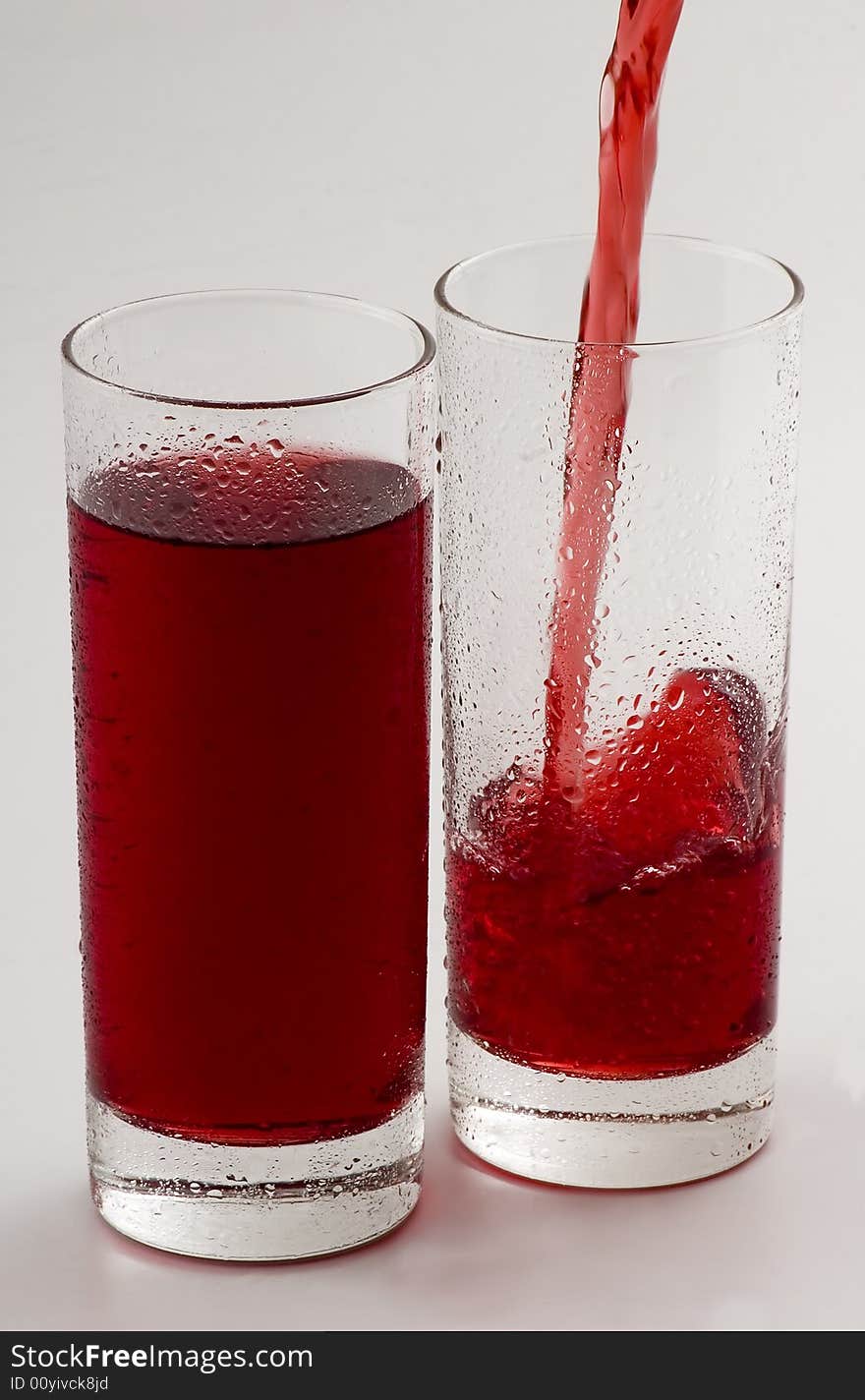 Glass glasses with a red drink. Glass glasses with a red drink