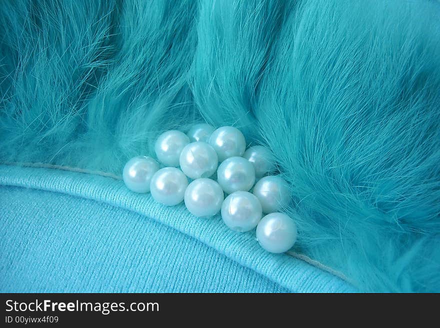 Beads in fur on sweater