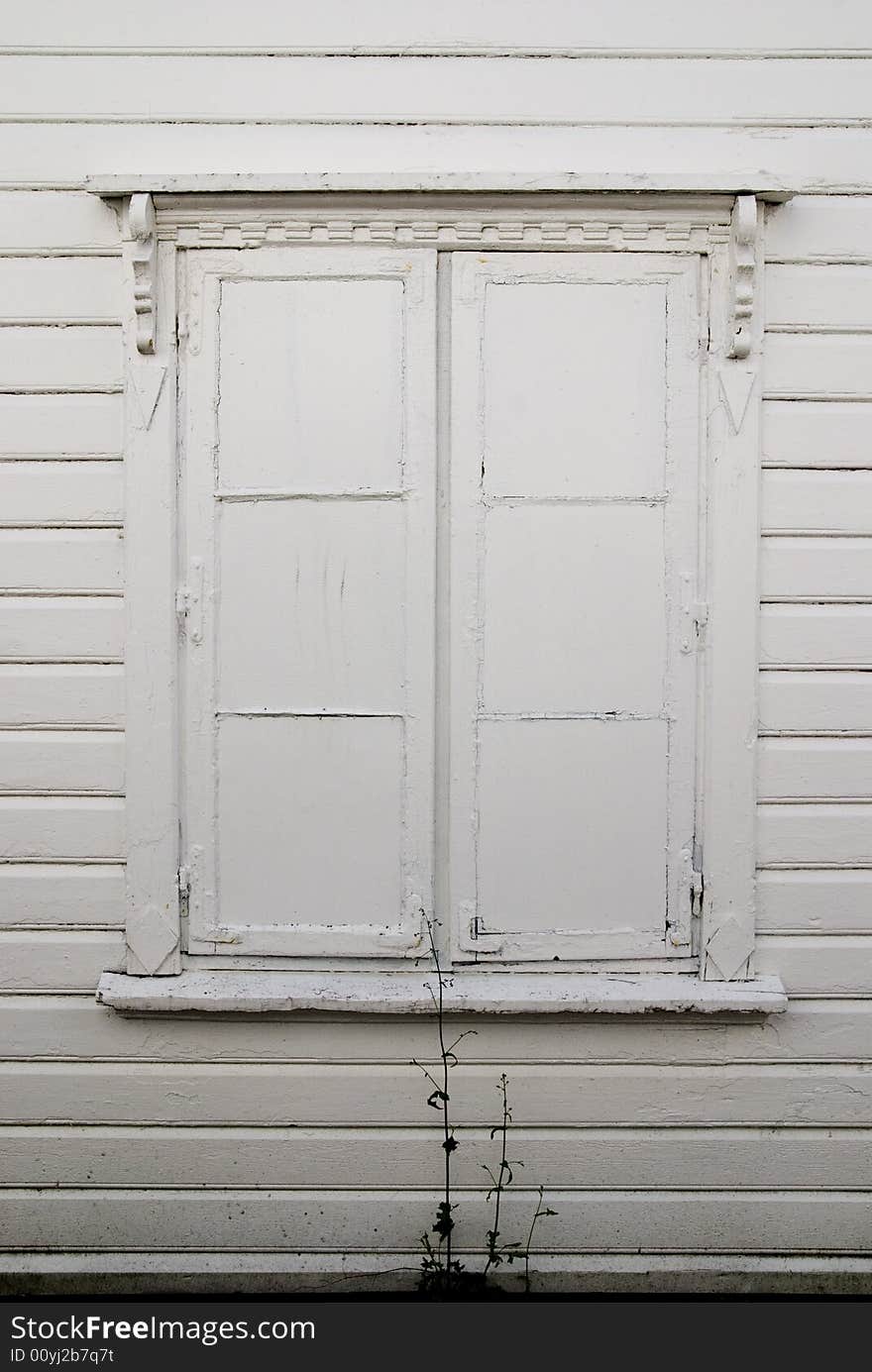 Window painted with white paint, outside, single window, day. Window painted with white paint, outside, single window, day.