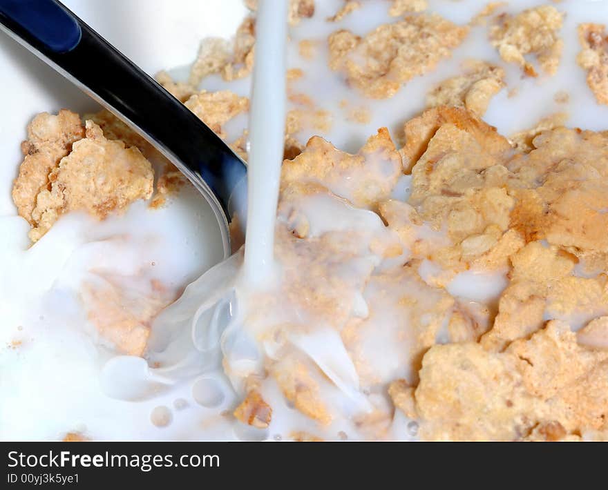 Milk Pouring In Cereal Corn Flakes