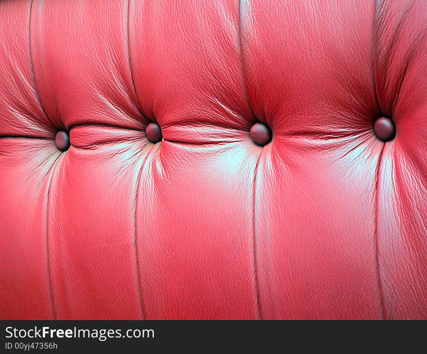 Grunge red leather seat background