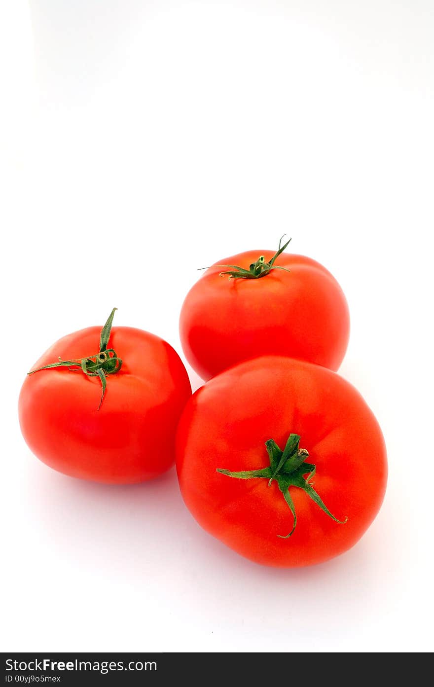 Bright Red Isolated Tomatoes on white background