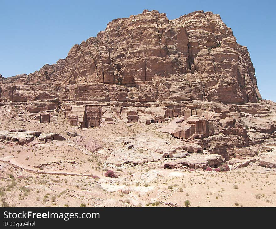 Archaeological site of Petra in Jordan surrounded by beautiful mountains. Archaeological site of Petra in Jordan surrounded by beautiful mountains