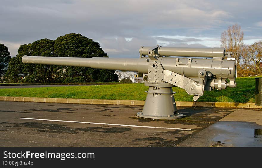 A cannon mounted in a car park