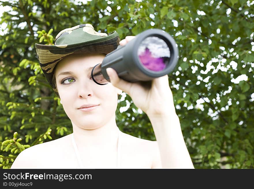 Woman searching with binocular in her hands. Woman searching with binocular in her hands