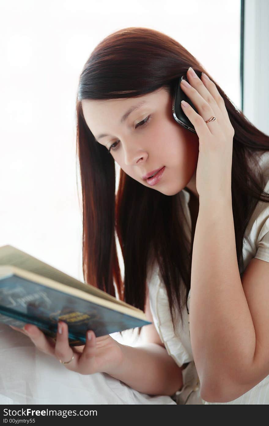 Beautiful girl with book: education, fashion. Beautiful girl with book: education, fashion.