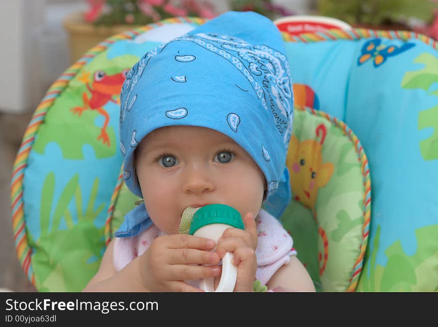 Girl eating a fruit