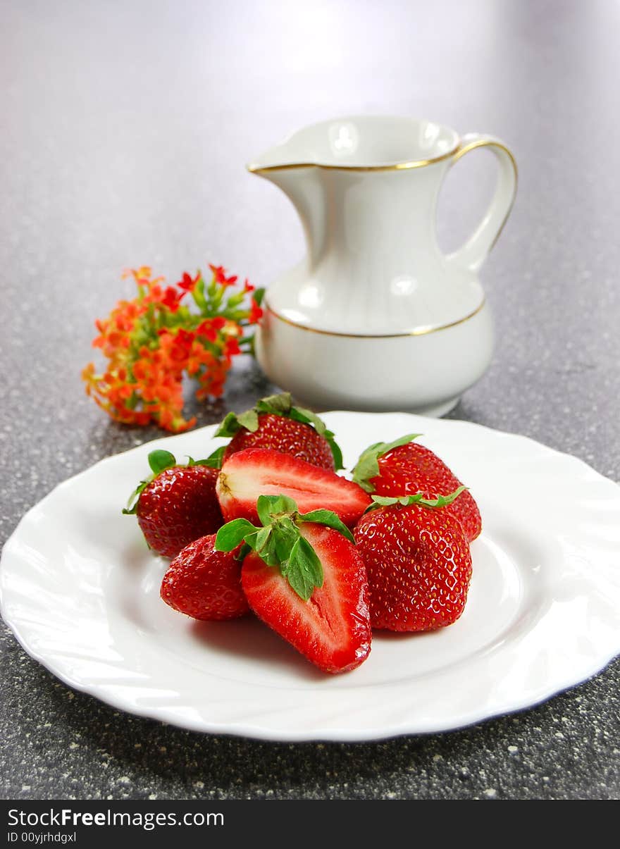 Fresh strawberry on white plait