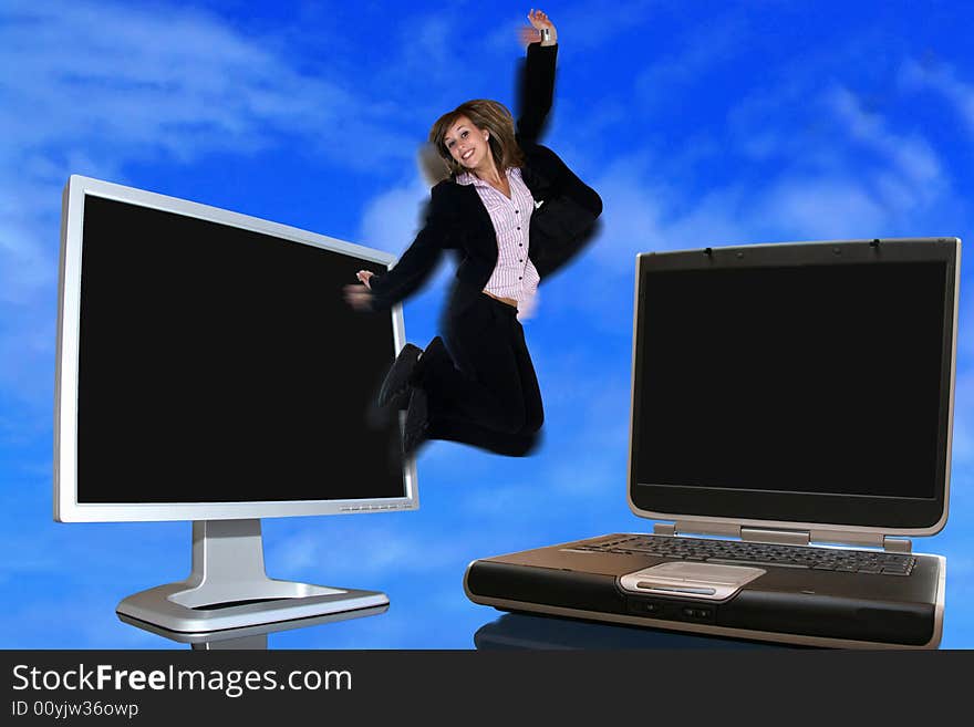 Business girl jumping: from lcd monitor to the laptop with sky