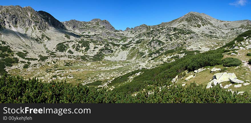 Mountain peak in Retezat Carpathians ridge (Southern of Romania). This summit is Bucura, with 2433 m high. Mountain peak in Retezat Carpathians ridge (Southern of Romania). This summit is Bucura, with 2433 m high.