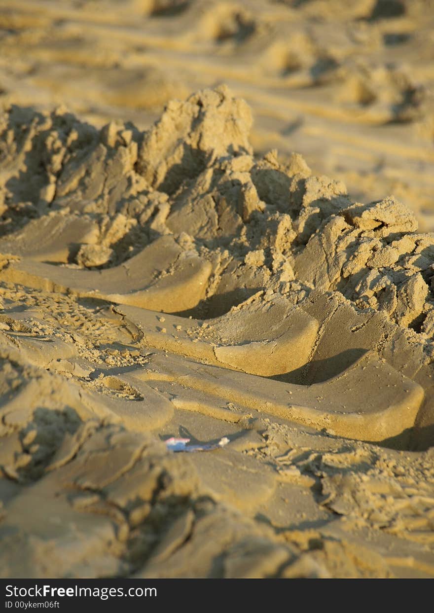 A beautifull shot of some pneumatic tracks on the sand