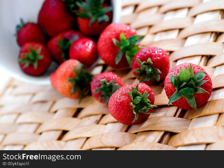 Fresh strawberrys on a woven platter