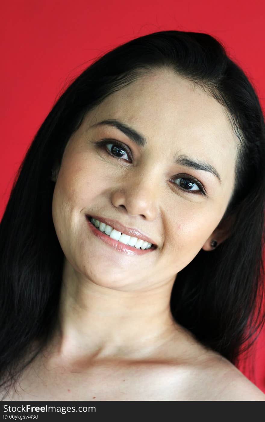 Close-up portrait of a beautiful Thai woman. Close-up portrait of a beautiful Thai woman.