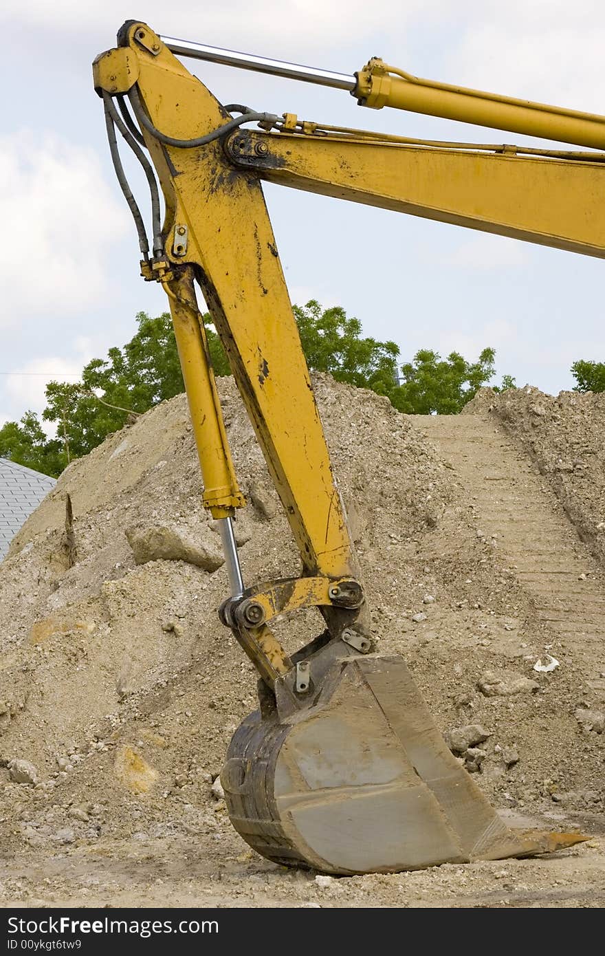 Hydrologic cylinders on a backhoe