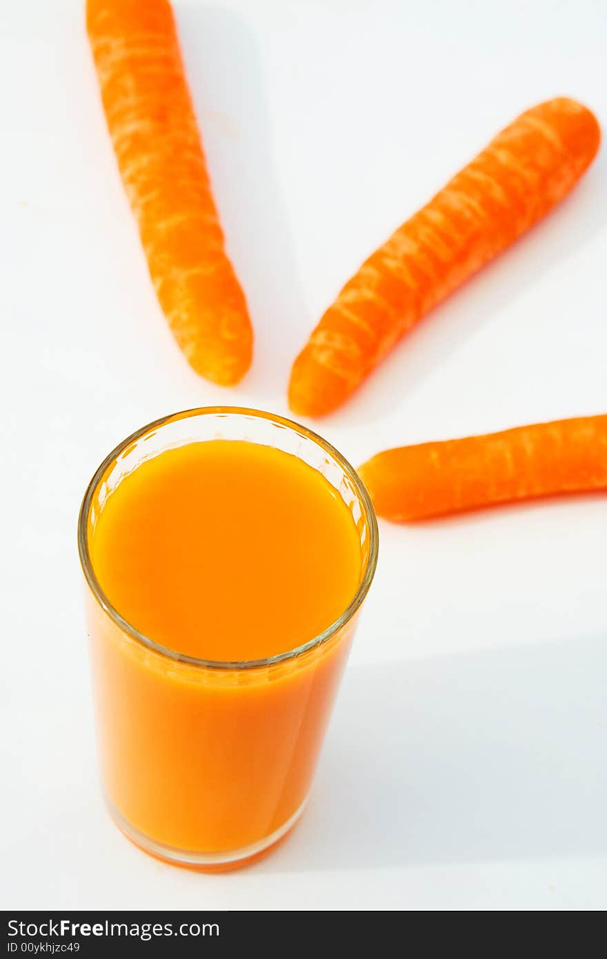 Carrots and carrot juice isolated on white