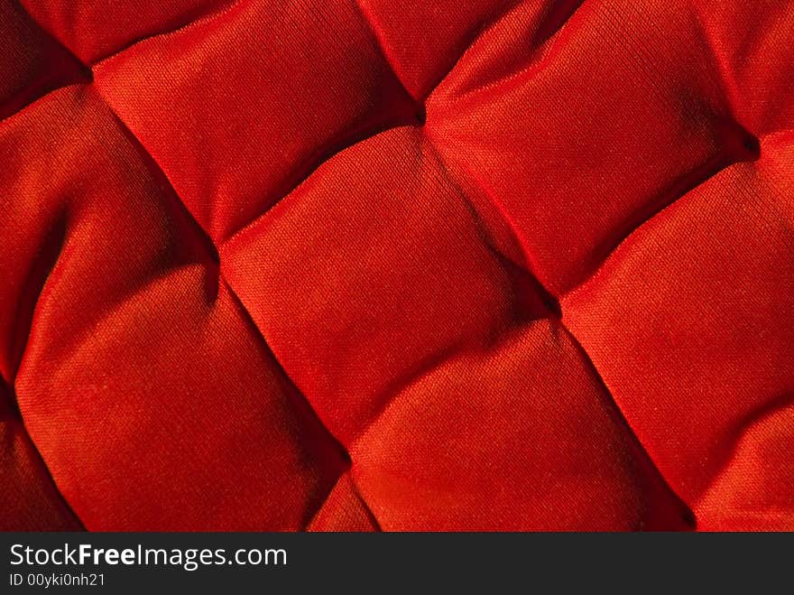 A detail image of a red cushion