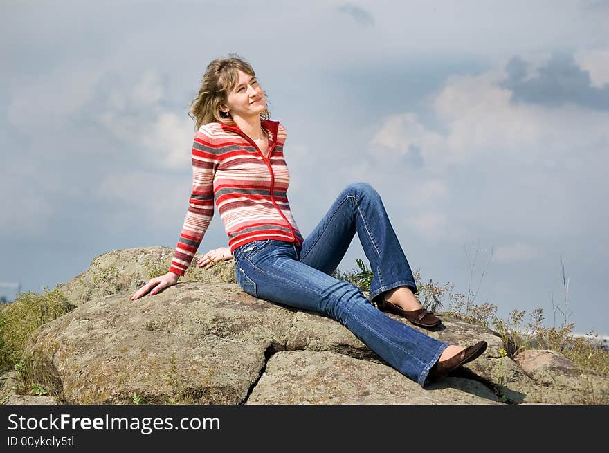 Girl on stone