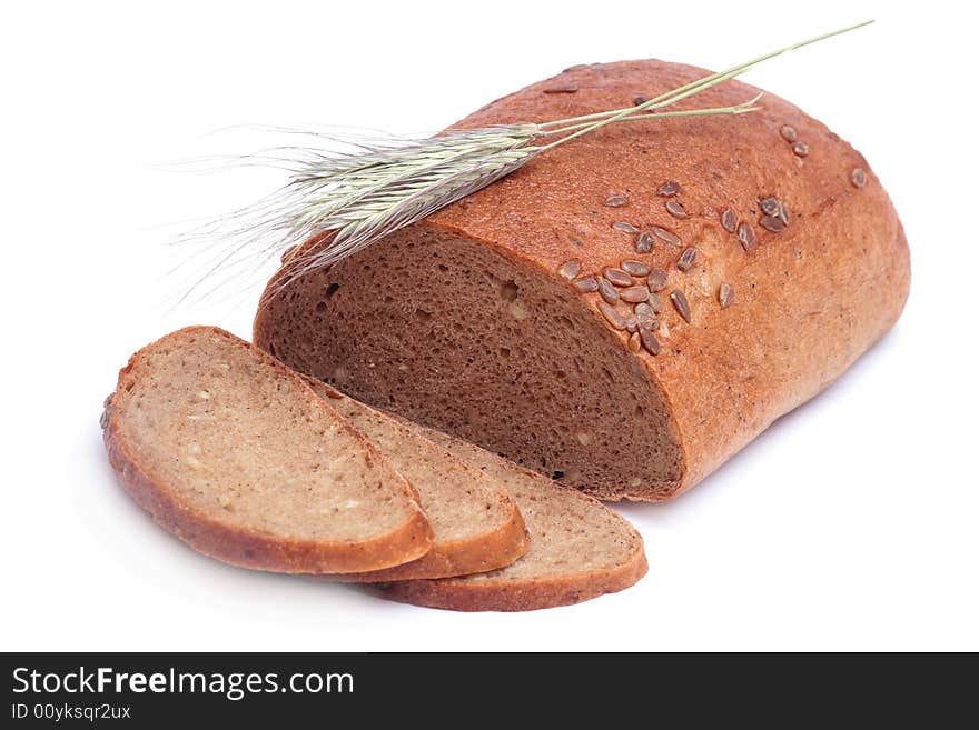 Bread isolated on white background with wheat ears. Bread isolated on white background with wheat ears.