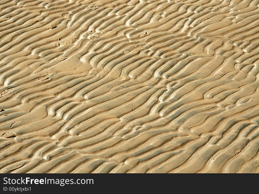 Sandy wave on a coast after outflow