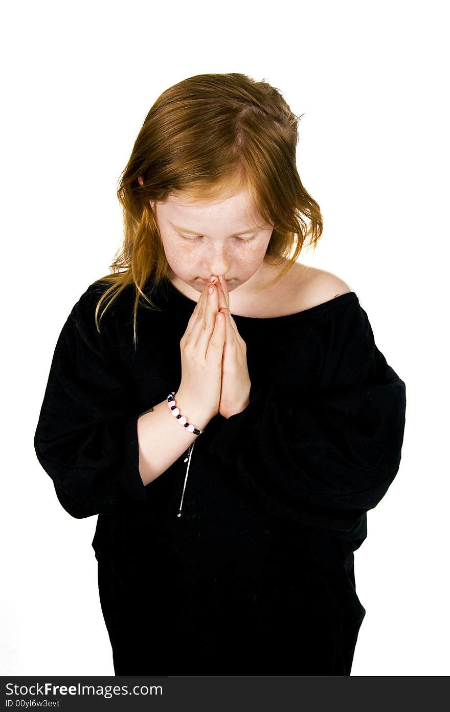 Little girl is praying befor bedtime. Little girl is praying befor bedtime