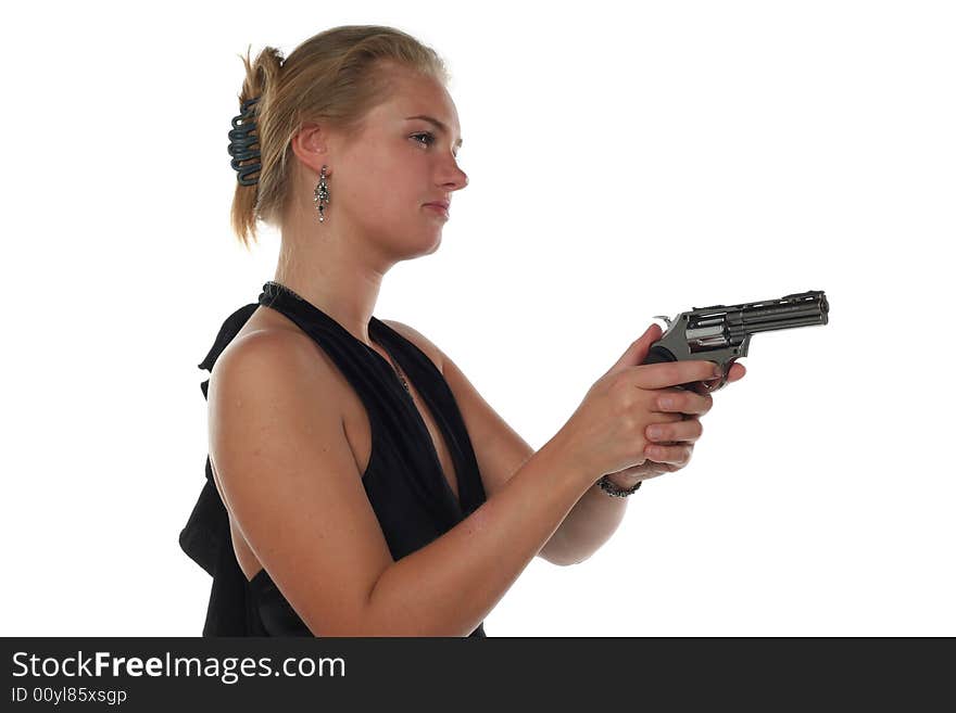 Young blond woman in black dress with revolver isolated on white background. Young blond woman in black dress with revolver isolated on white background