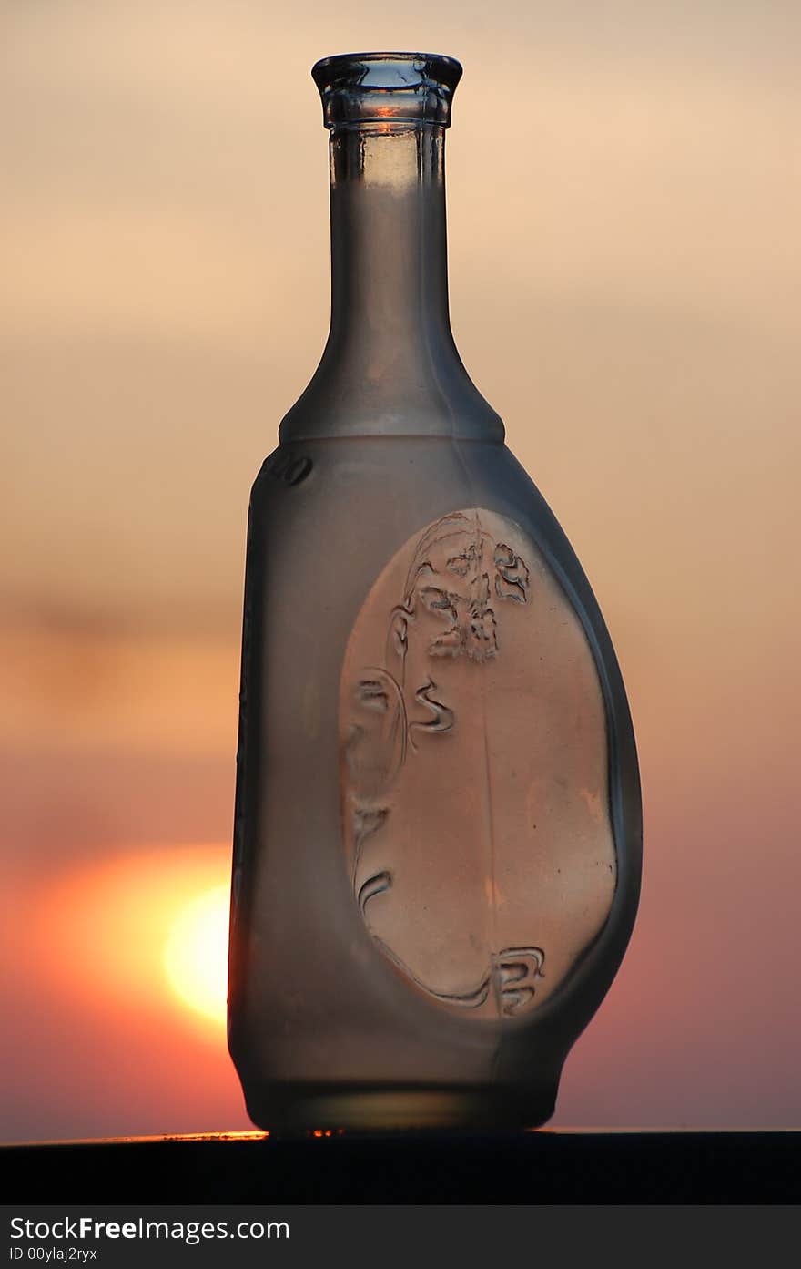 Bottle at sunset